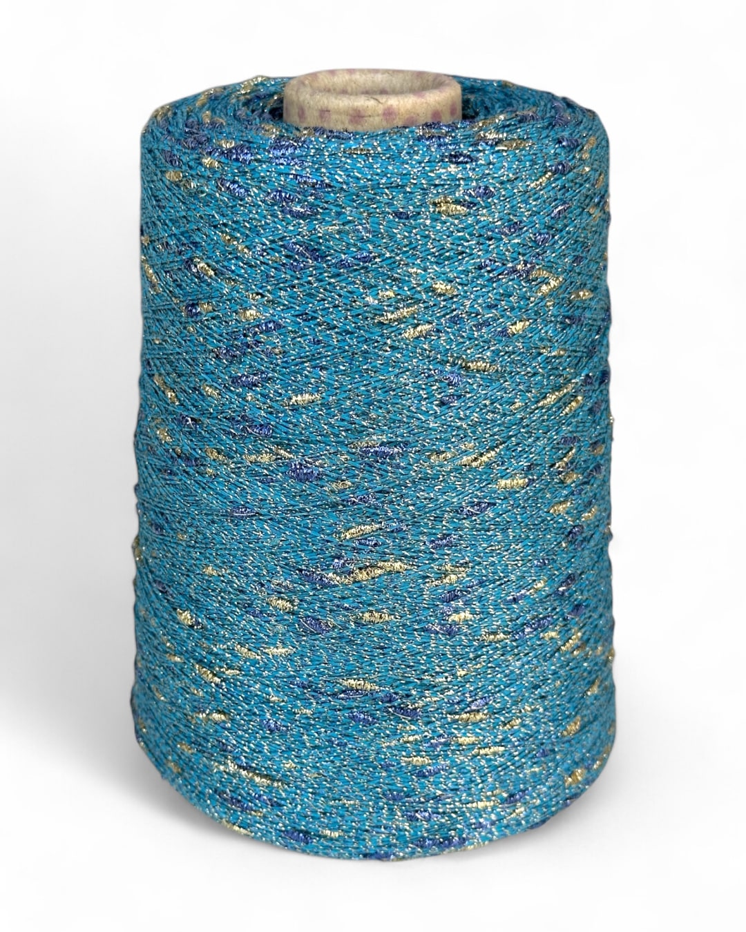 Stellina yarn in Treasure Bay — turquoise yarn with gold and cornflower blue knots, cone and close-up with ruler