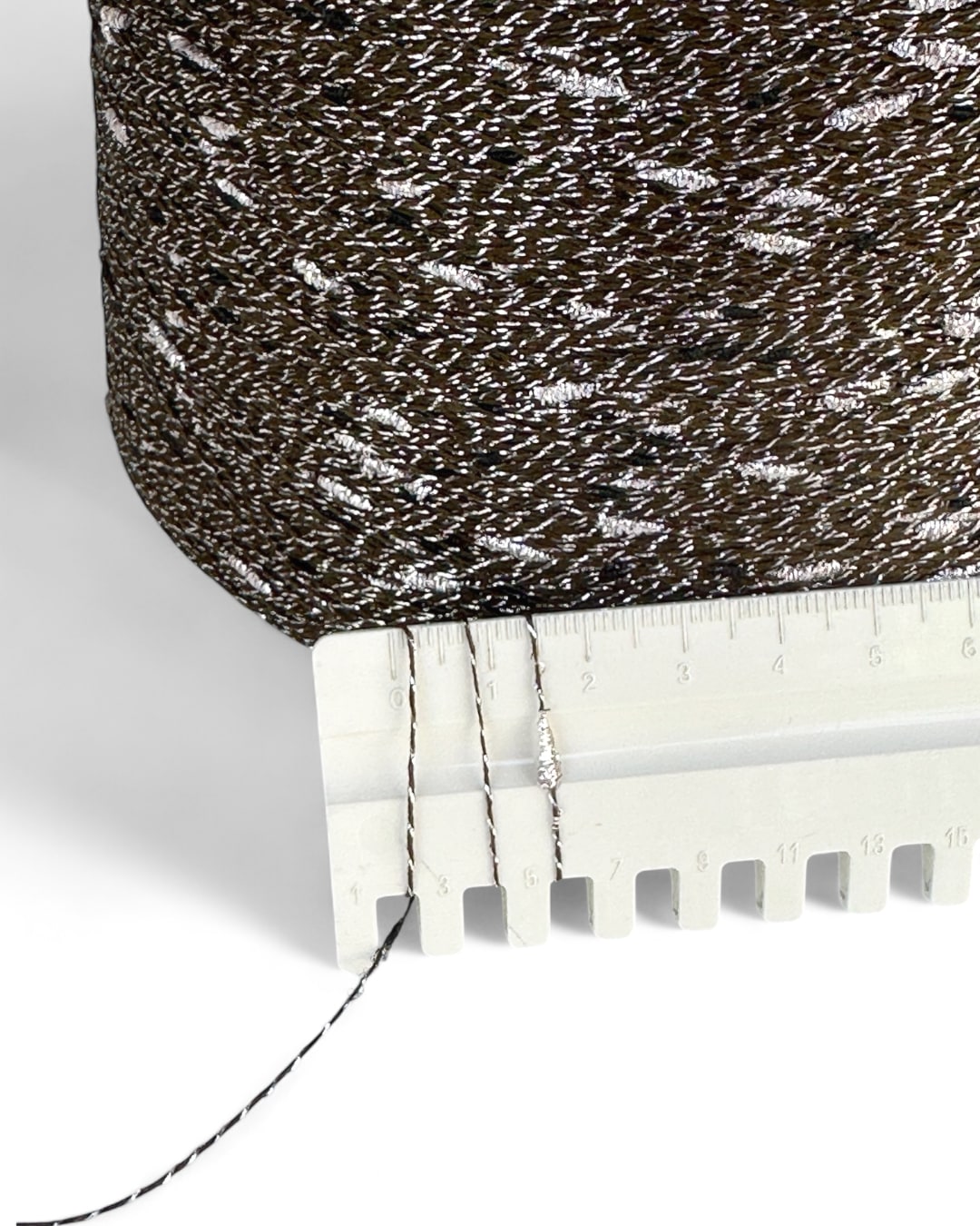 Textured fabric with a ruler showing measurement details