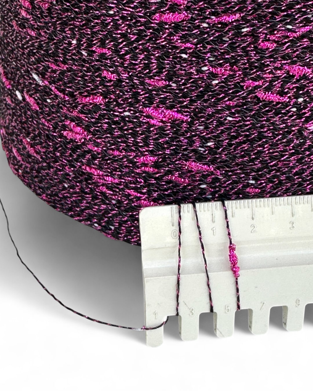 Stellina Fuchsia Coal – dettaglio texture e nodi