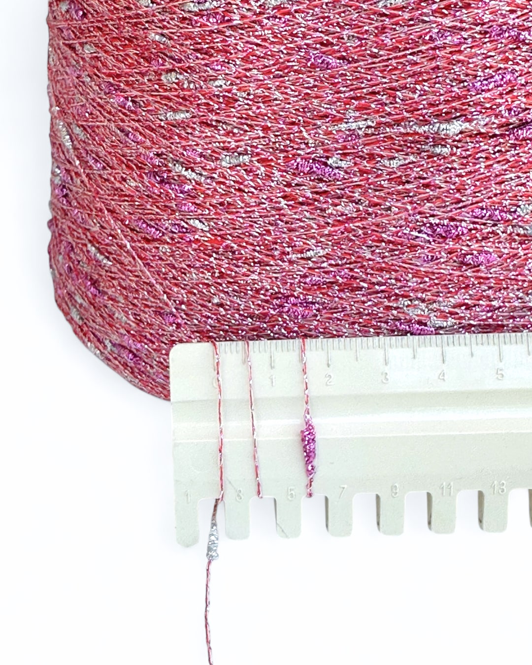 Filato Pink Fizz con base rosa corallo e riflessi argento e rosa