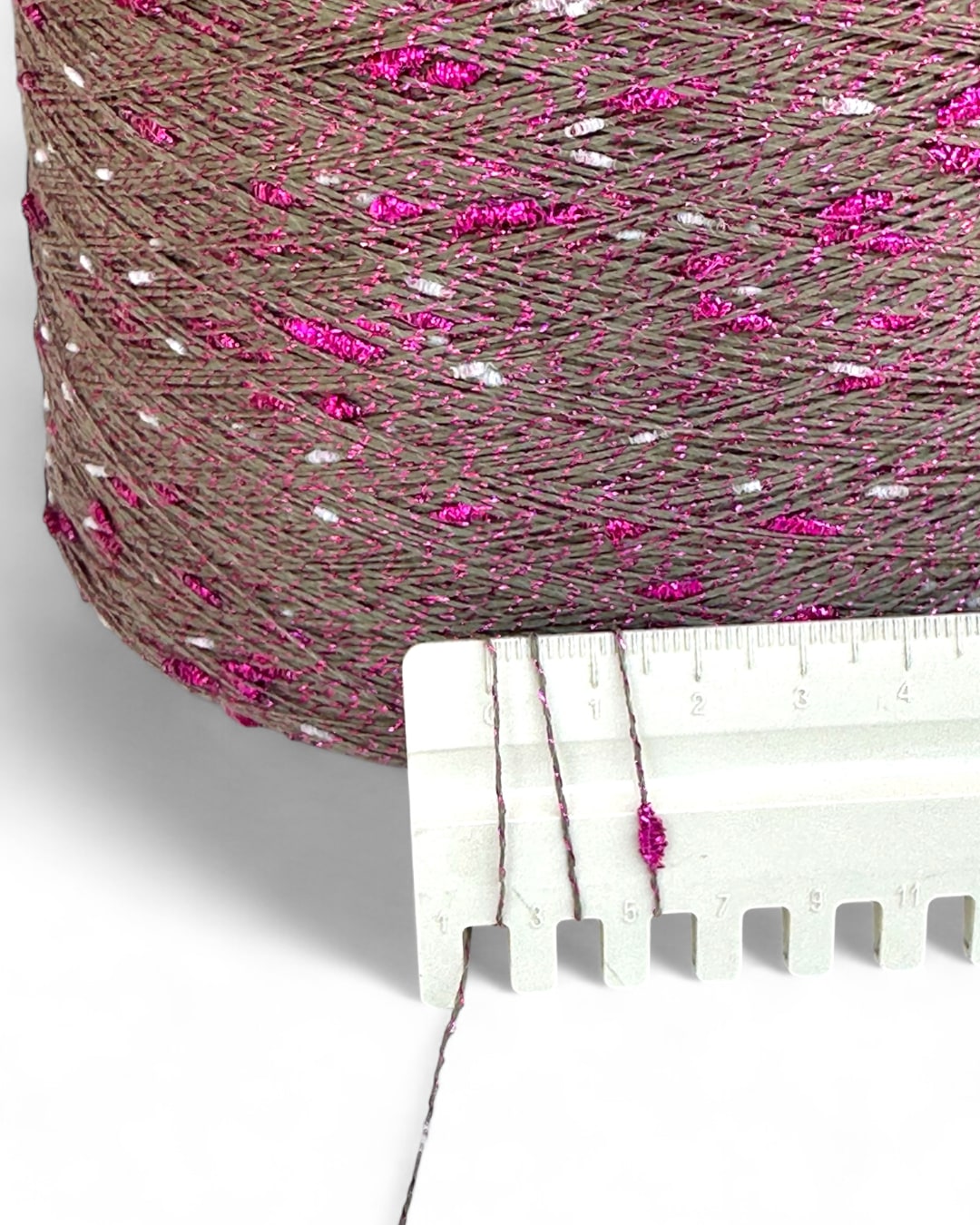 Velvet Moss knot yarn with olive base and fuchsia-silver sparkle