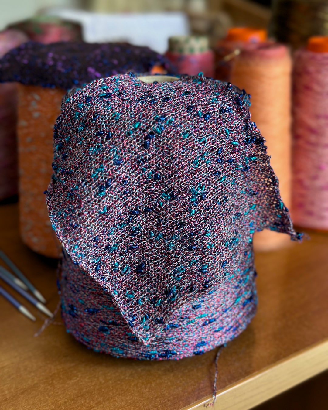 “Electric Bloom” — decorative knot yarn with shimmer and color