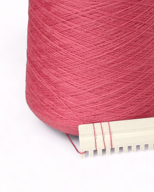 Cone of fine Italian yarn in delicate pink shade