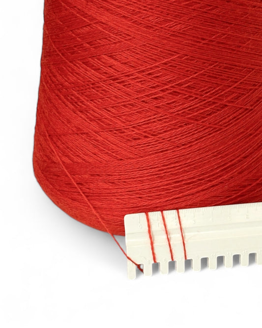 Cone of fine Italian red-orange yarn