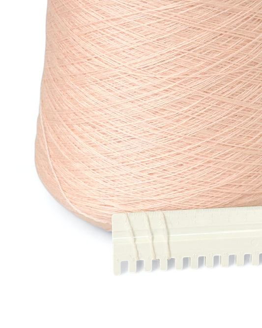 Italian yarn cone in a warm pale shade