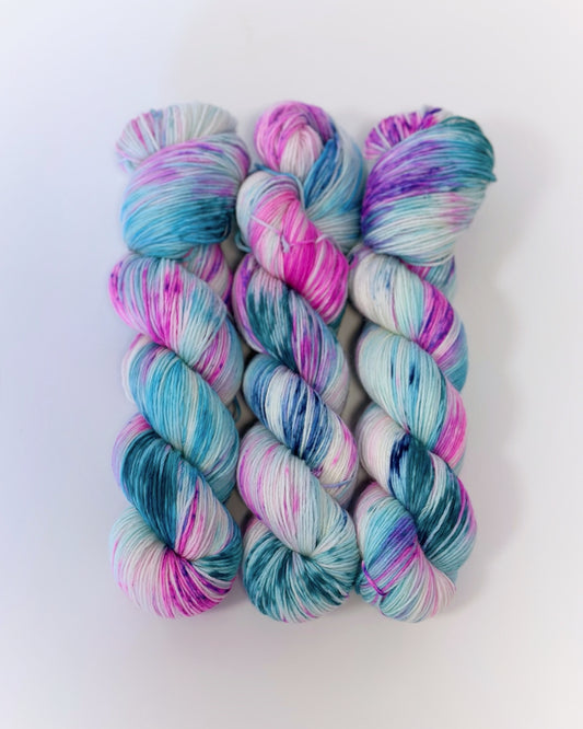 Merino superwash and nylon hand dyed yarn color Unicorn, 100g