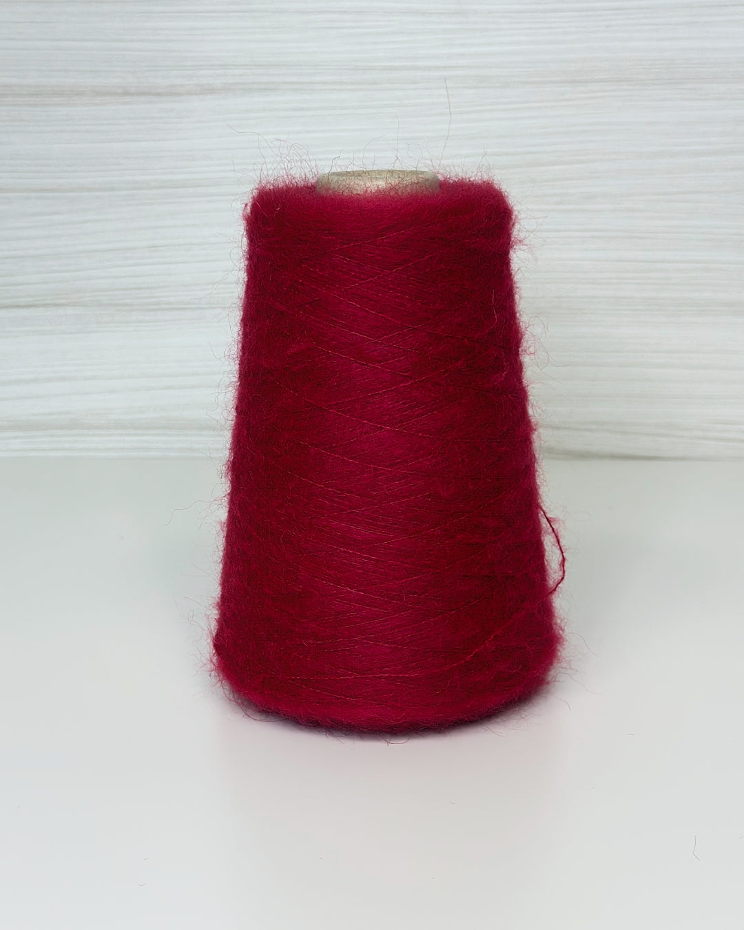 Filato Mohair su cono, 950m/100g, colore Vino