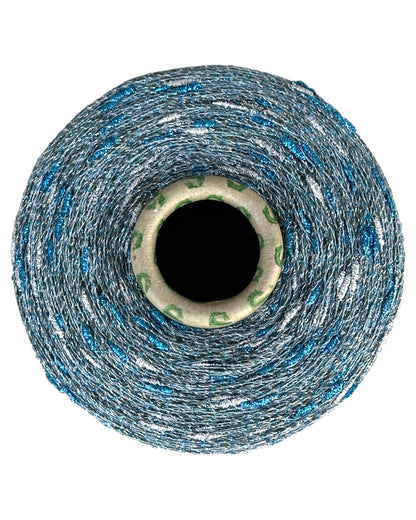 Top view of Stellina Ice Flash yarn cone with icy silver and turquoise sparkle