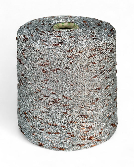Stellina knot yarn with shimmer, Copper Ice color, on cone