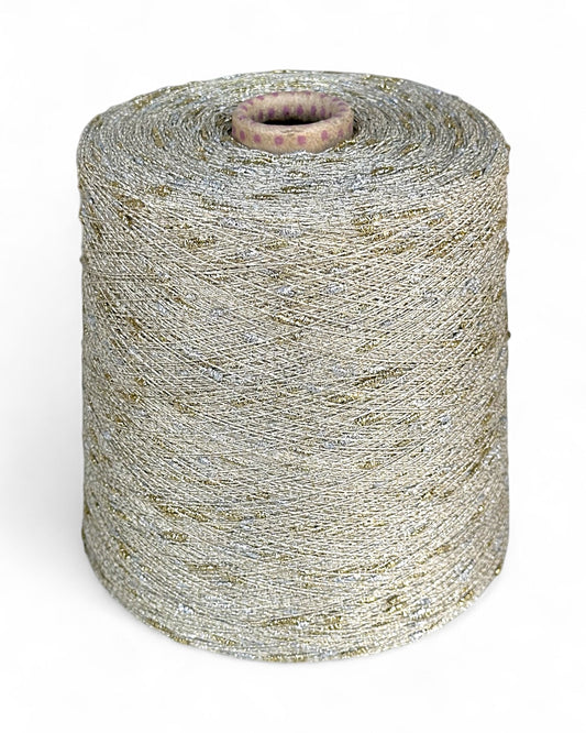 Stellina “Moonlight Frost” knot yarn — pale base with silver and gold sparkle, on cone
