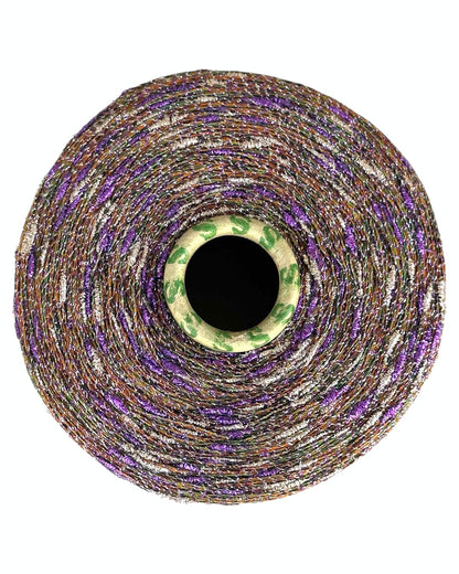 Spool of multicolored thread on a white background