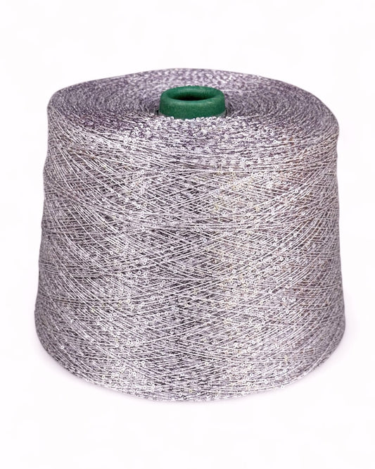 “Lilac Mist” sequin yarn on cone — light lavender base, front view
