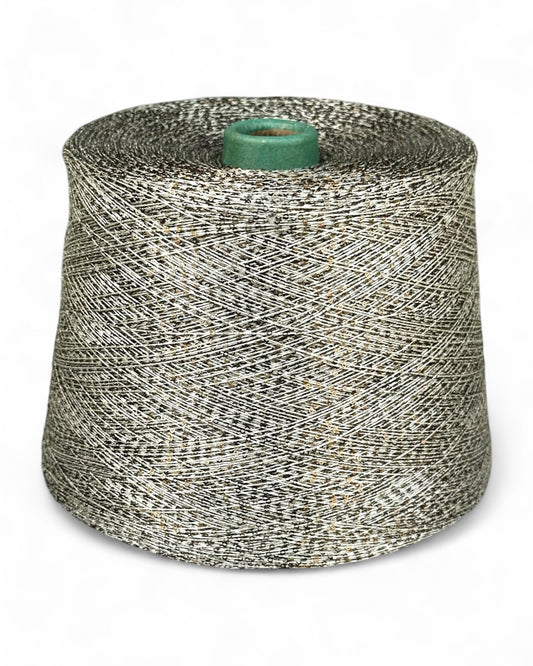 Gilded Ash” sequin yarn on a pale base — front view