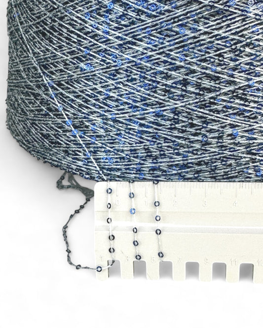 Close-up of “Blue Frost” with ruler — thin thread and blue sequins