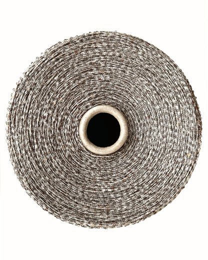 Roll of wire mesh on a white background
