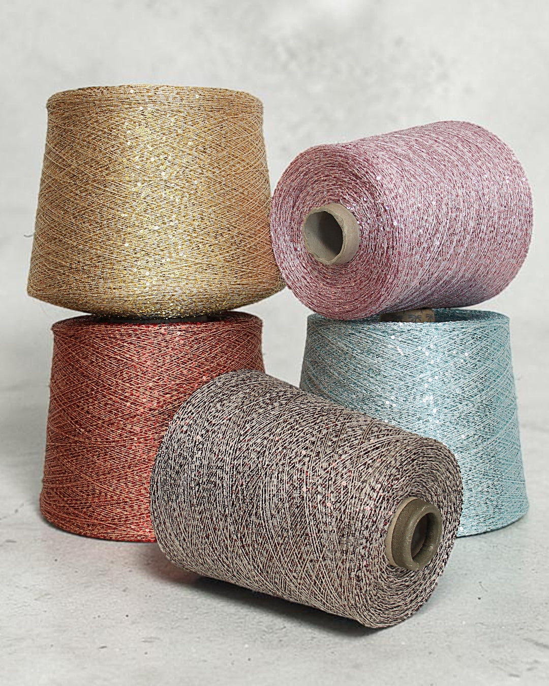 Delicate sparkle yarn on a light base for knitting & crochet