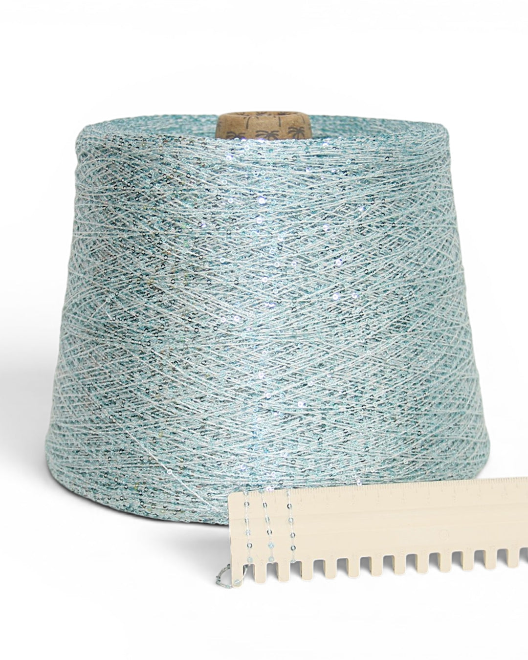 Delicate sparkle yarn on a light base for knitting & crochet